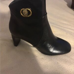 Sleek Black and Gold Ankle Booties with High Heel